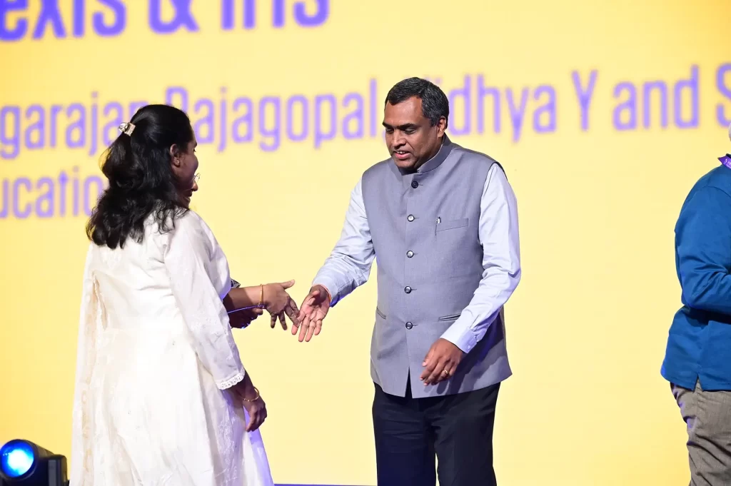 Vidhya receiving Infosys Foundation’s Aarohan Social Innovation Awards for Hexis & Iris